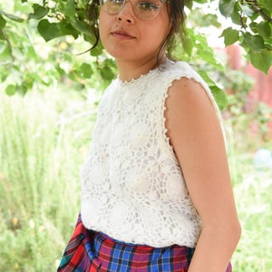 Beautiful hand knit, sleeveless sweater shirt
